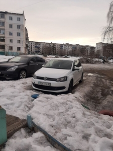 Volkswagen Polo белый Рудный