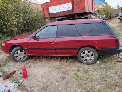 Автомобиль Субару лигами полный привод