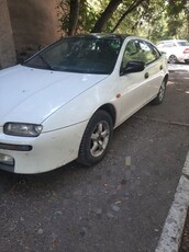 продается-экономичный-автомобиль-mazda-323.