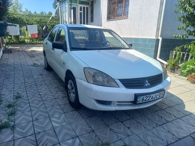 Lancer 2009 год. 1.3