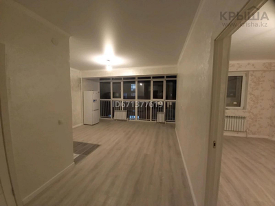 2-комнатная квартира, 52 м², 9/10 этаж, мкр Шугыла, Жунисовв 14/18 — Абая